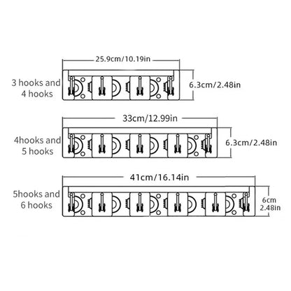 Wall-mounted broom holder