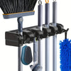 Wall-mounted broom holder