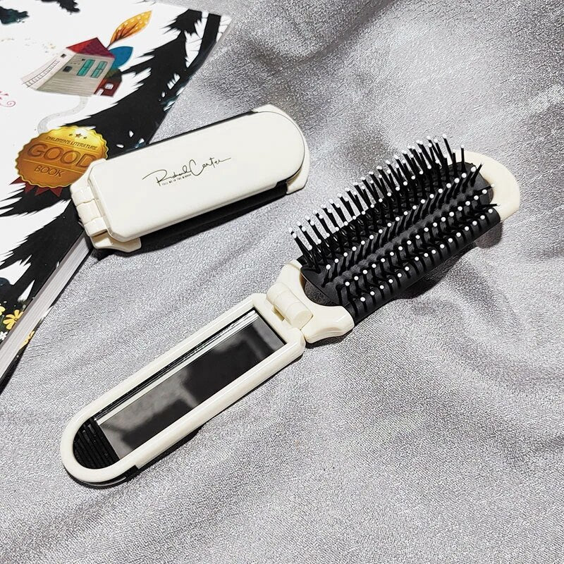 Compact Hairbrush with Built-in Mirror