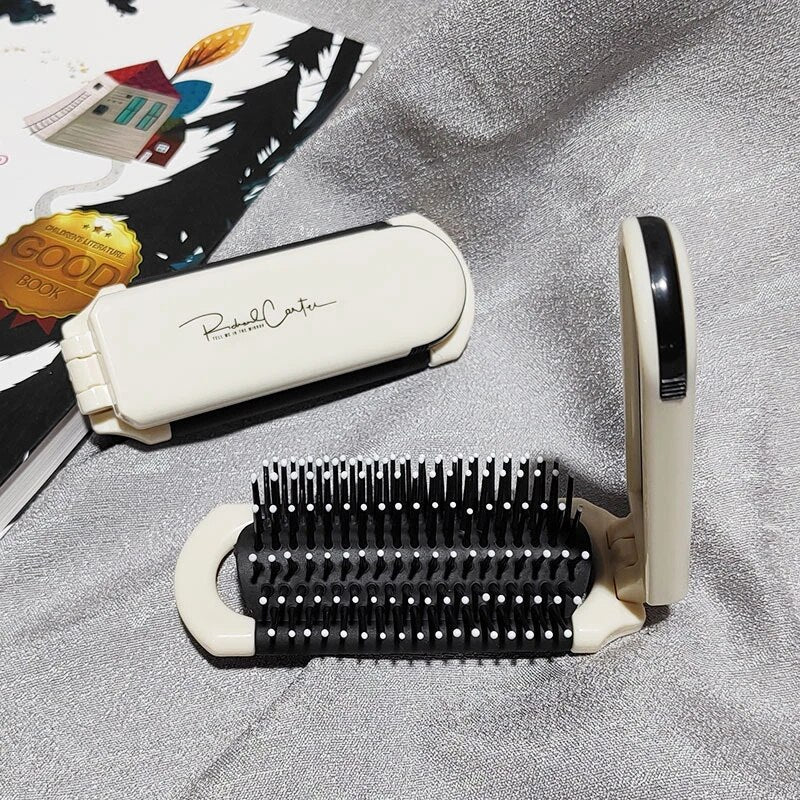 Compact Hairbrush with Built-in Mirror