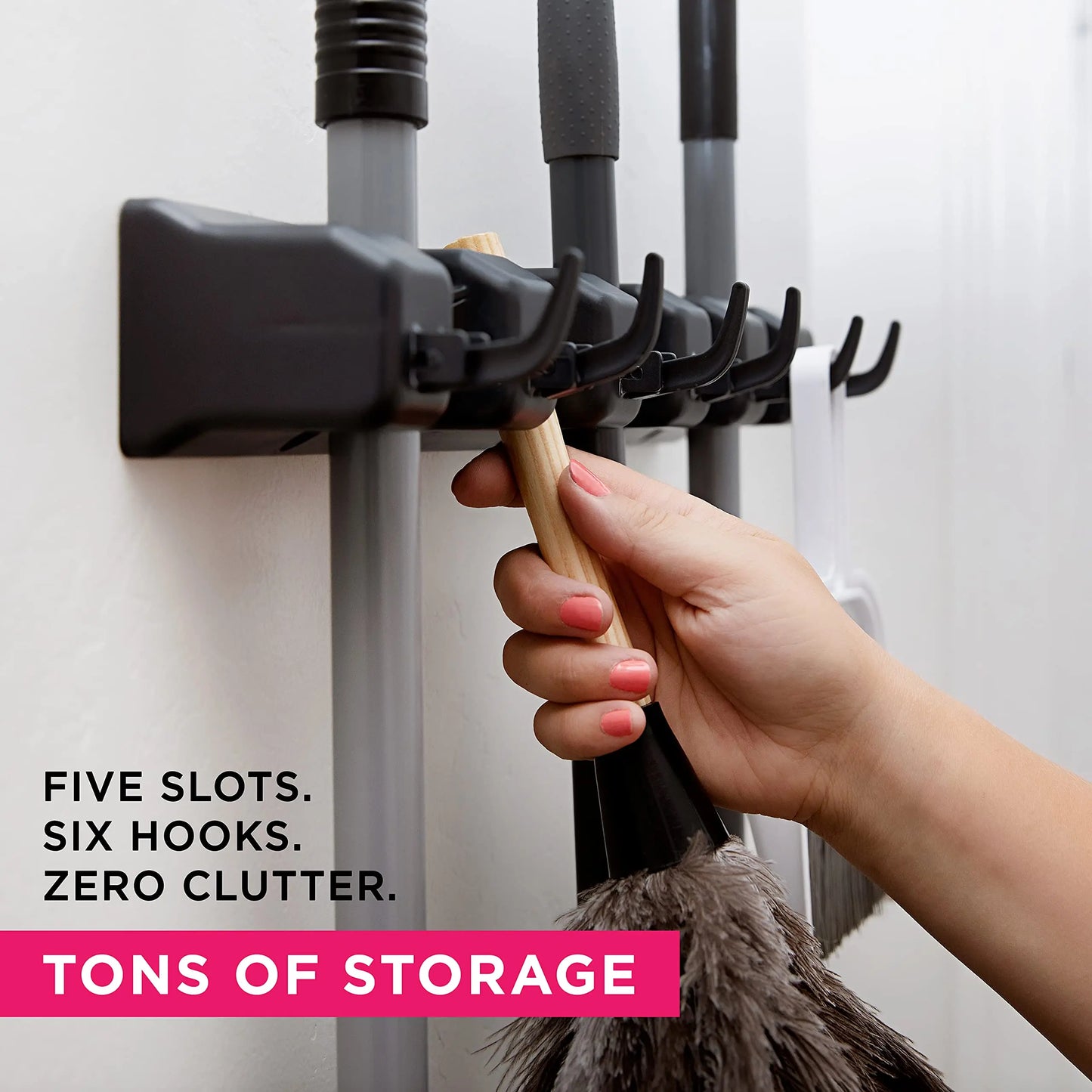 Wall-mounted broom holder
