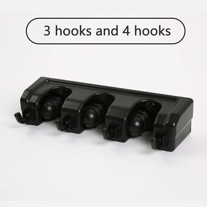 Wall-mounted broom holder