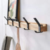 Wall-mounted coat rack with adjustable double hooks